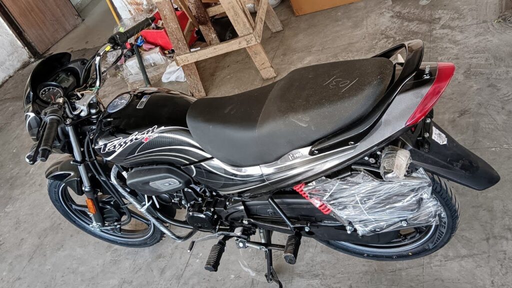 110 KM/L Mileage Bike Launched! New Hero Passion Pro Hybrid Brings Electric + Petrol Power at Budget Price